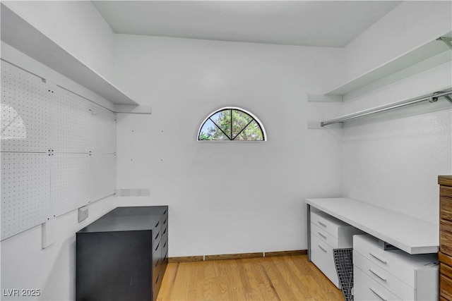 7909 Canoe Ln, Las Vegas, NV 89145 - spacious closet with light wood finished floors