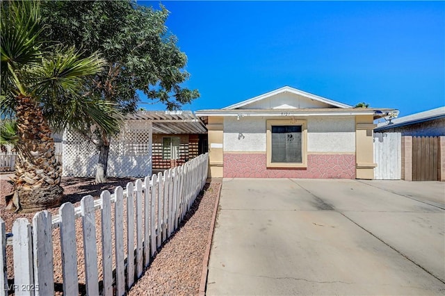 5121 Gains Mill St, Las Vegas, NV 89122 - view of front of home with stucco siding