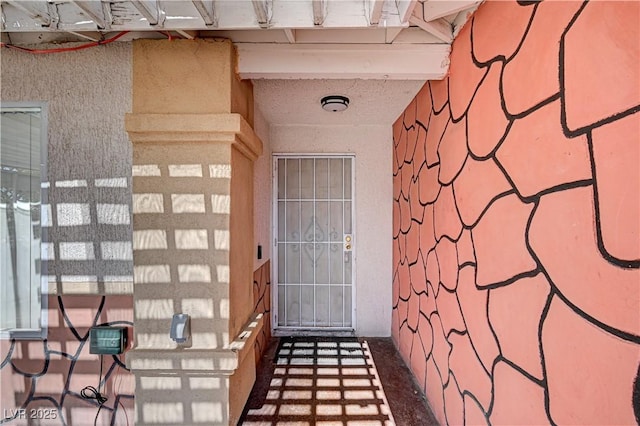 5121 Gains Mill St, Las Vegas, NV 89122 - entrance to property featuring stucco siding