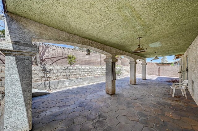 5121 Gains Mill St, Las Vegas, NV 89122 - fenced backyard with a patio