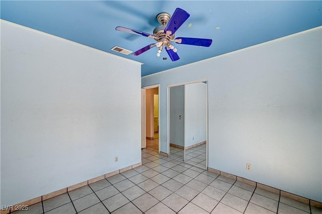 5121 Gains Mill St, Las Vegas, NV 89122 - unfurnished room featuring a ceiling fan and light tile patterned floors