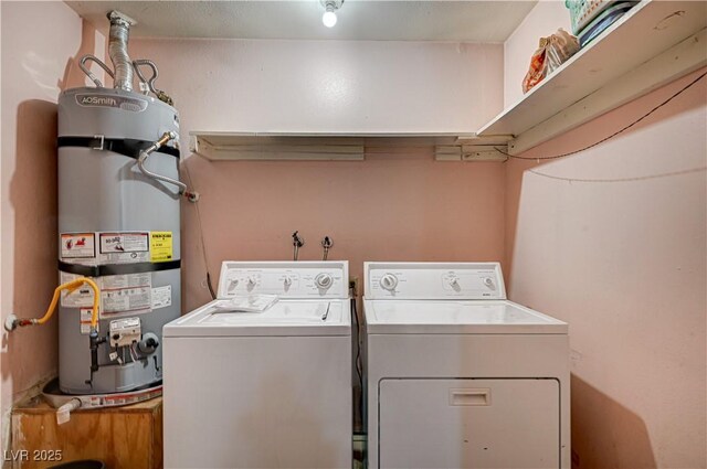 5121 Gains Mill St, Las Vegas, NV 89122 - laundry room with secured water heater and separate washer and dryer