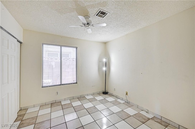 5121 Gains Mill St, Las Vegas, NV 89122 - unfurnished bedroom with a textured ceiling and a ceiling fan