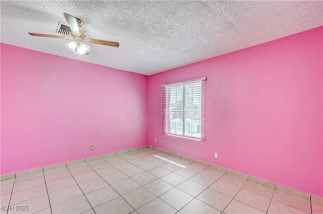 5121 Gains Mill St, Las Vegas, NV 89122 - tiled spare room with a textured ceiling and ceiling fan