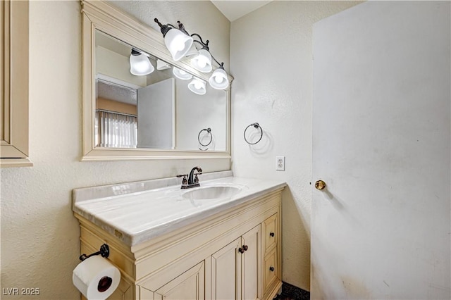 5121 Gains Mill St, Las Vegas, NV 89122 - bathroom featuring vanity and a textured wall