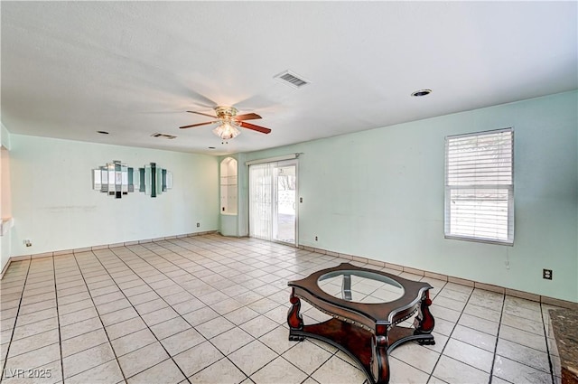5121 Gains Mill St, Las Vegas, NV 89122 - unfurnished living room with light tile patterned floors and ceiling fan