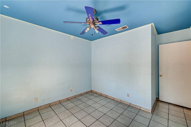 5121 Gains Mill St, Las Vegas, NV 89122 - spare room featuring a ceiling fan and light tile patterned floors