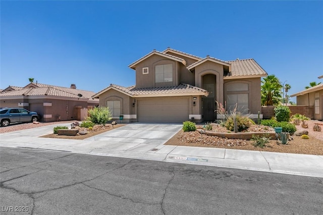 6109 Sandstone Mesa Dr, Las Vegas, NV 89130 - mediterranean / spanish-style home featuring stucco siding, driveway, a tiled roof, and a garage