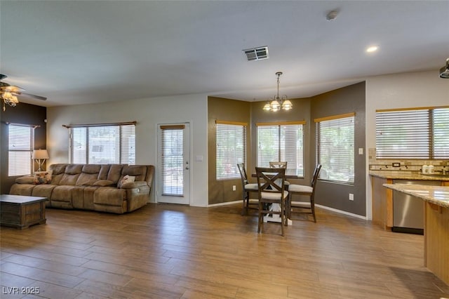 6109 Sandstone Mesa Dr, Las Vegas, NV 89130 - living area with light wood-style flooring, a chandelier, ceiling fan, and recessed lighting