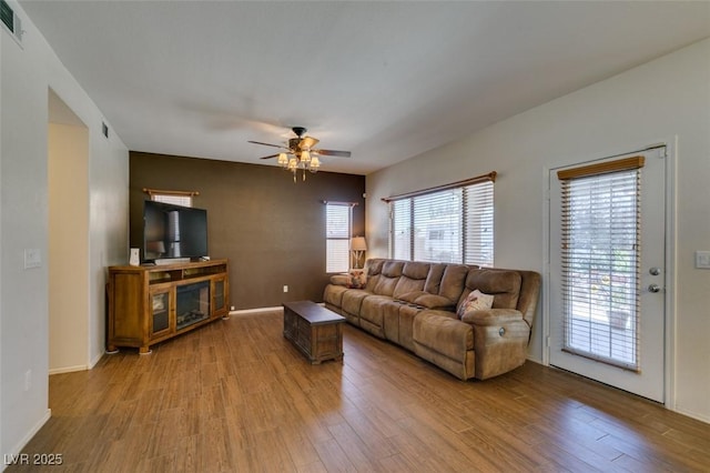 6109 Sandstone Mesa Dr, Las Vegas, NV 89130 - living room featuring ceiling fan and wood finished floors