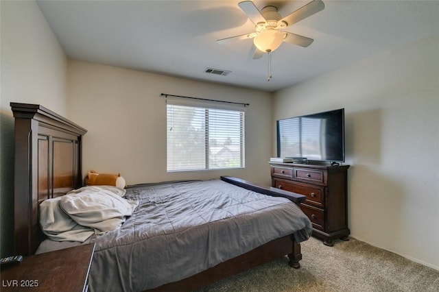 6109 Sandstone Mesa Dr, Las Vegas, NV 89130 - bedroom featuring light carpet and a ceiling fan