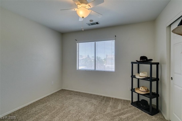 6109 Sandstone Mesa Dr, Las Vegas, NV 89130 - spare room featuring a ceiling fan and carpet floors