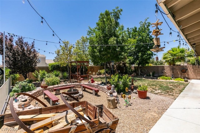 6109 Sandstone Mesa Dr, Las Vegas, NV 89130 - fenced backyard with a fire pit