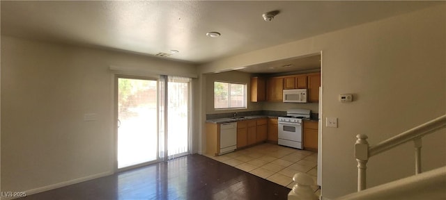 5413 Bristol Bend Ct, Las Vegas, NV 89135 - kitchen featuring white appliances and dark countertops