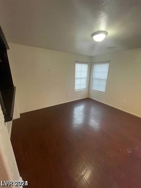 5413 Bristol Bend Ct, Las Vegas, NV 89135 - unfurnished room featuring dark wood finished floors and baseboards