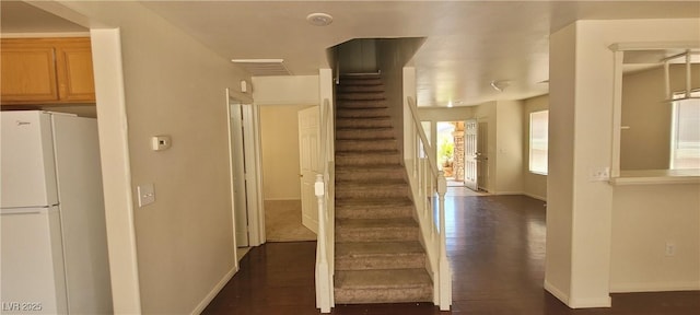 5413 Bristol Bend Ct, Las Vegas, NV 89135 - corridor featuring wood finished floors and stairs