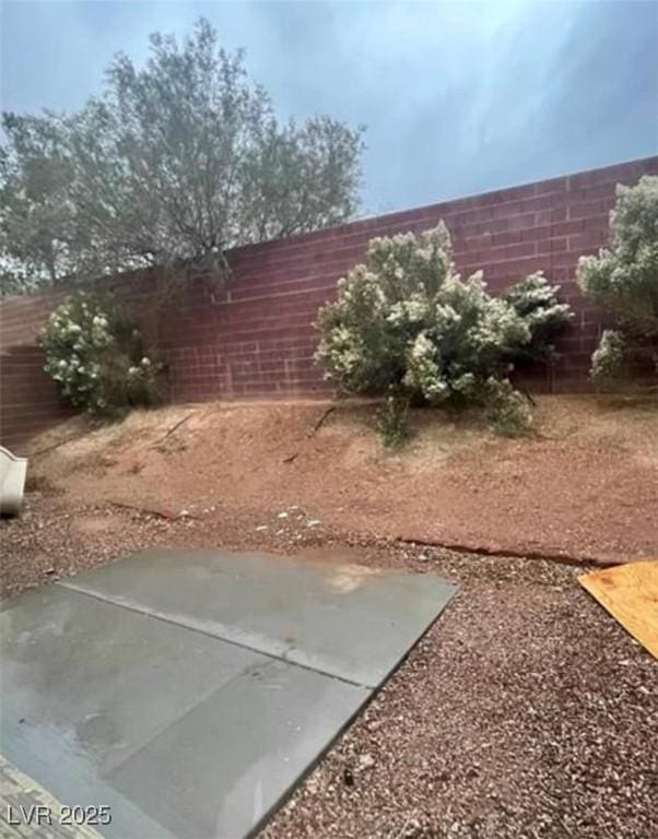5413 Bristol Bend Ct, Las Vegas, NV 89135 - fenced backyard with a patio area