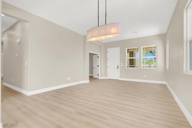 5908 Big Horn View St, North Las Vegas, NV 89031 - unfurnished living room with light wood-style flooring