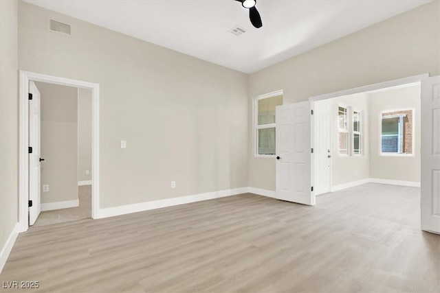 5908 Big Horn View St, North Las Vegas, NV 89031 - empty room featuring a ceiling fan and light wood-style floors