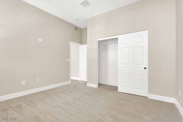 5908 Big Horn View St, North Las Vegas, NV 89031 - unfurnished bedroom featuring light colored carpet and a closet