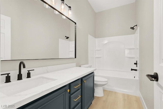 5908 Big Horn View St, North Las Vegas, NV 89031 - full bathroom with vanity, wood finished floors, and shower / bathtub combination