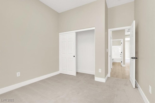 5908 Big Horn View St, North Las Vegas, NV 89031 - unfurnished bedroom with light carpet and a closet