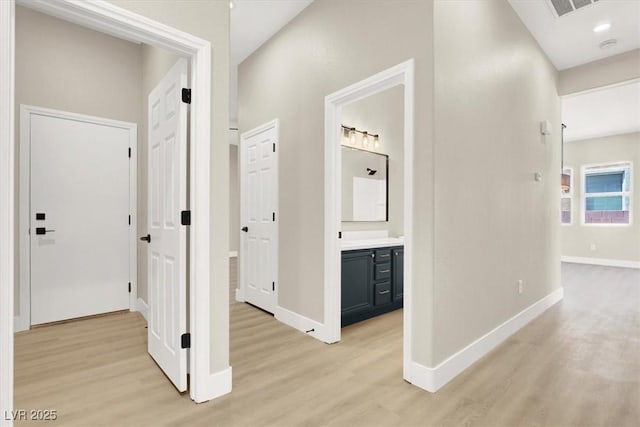5908 Big Horn View St, North Las Vegas, NV 89031 - hall with light wood-type flooring and baseboards