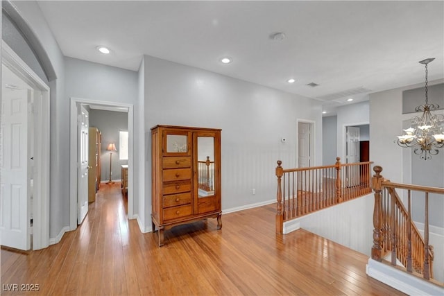 4651 Munich Ct, Las Vegas, NV 89147 - foyer entrance with a chandelier, light wood-type flooring, and recessed lighting