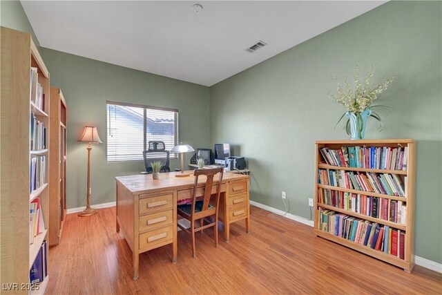 4651 Munich Ct, Las Vegas, NV 89147 - office with light wood finished floors and baseboards
