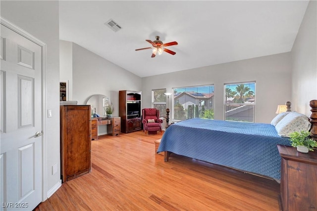 4651 Munich Ct, Las Vegas, NV 89147 - bedroom featuring vaulted ceiling, light wood-style flooring, and a ceiling fan