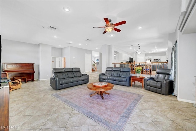 4651 Munich Ct, Las Vegas, NV 89147 - living area featuring a ceiling fan, light tile patterned floors, and recessed lighting