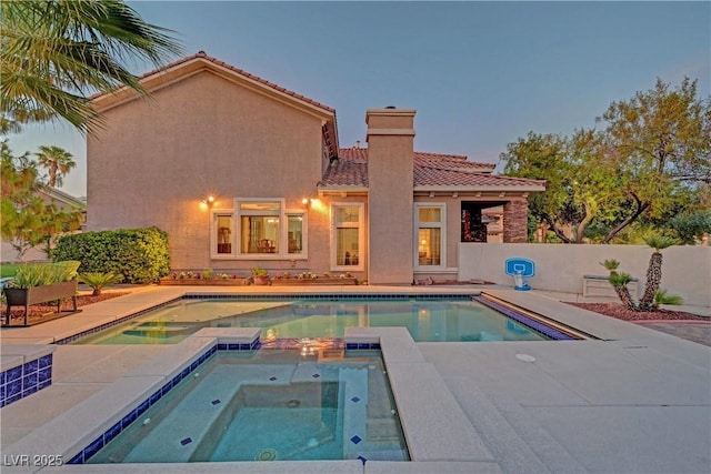 4651 Munich Ct, Las Vegas, NV 89147 - view of swimming pool with a pool with connected hot tub and a patio area