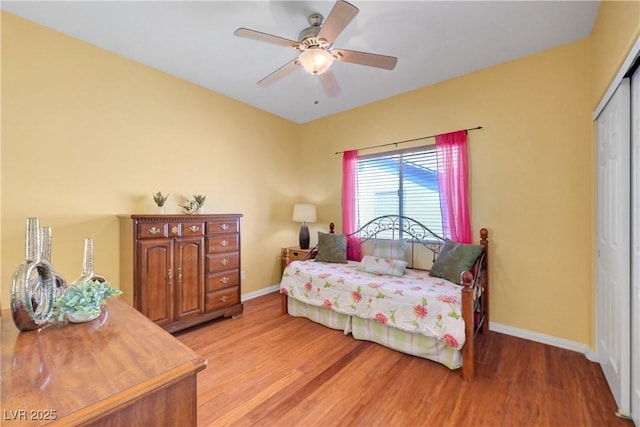 4651 Munich Ct, Las Vegas, NV 89147 - bedroom featuring a closet, light wood-style flooring, and a ceiling fan