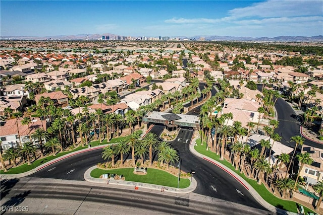 4651 Munich Ct, Las Vegas, NV 89147 - aerial view of property and surrounding area featuring a mountainous background and nearby suburban area
