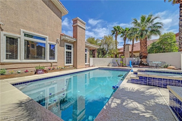 4651 Munich Ct, Las Vegas, NV 89147 - view of pool with an in-ground hot tub, a fenced backyard, and a patio area