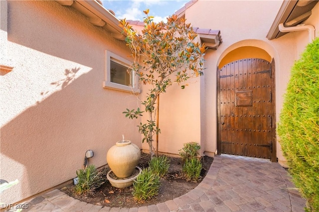 12276 Caminita Pl, Las Vegas, NV 89138 - entrance to property featuring stucco siding and a gate