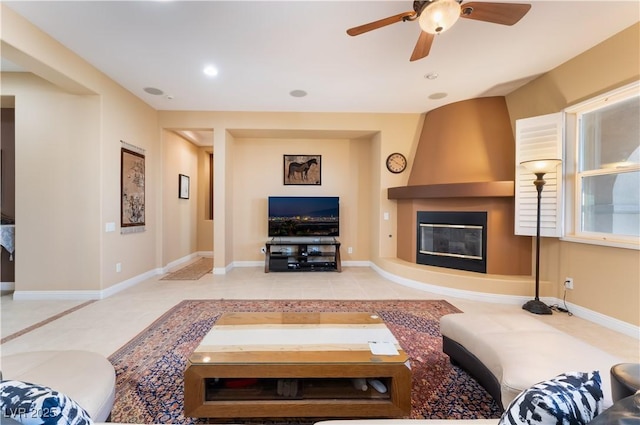 12276 Caminita Pl, Las Vegas, NV 89138 - living room featuring a large fireplace, ceiling fan, and recessed lighting