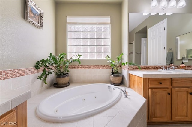 12276 Caminita Pl, Las Vegas, NV 89138 - full bathroom featuring vanity and a tub with jets
