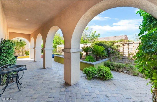 12276 Caminita Pl, Las Vegas, NV 89138 - fenced backyard featuring a patio area