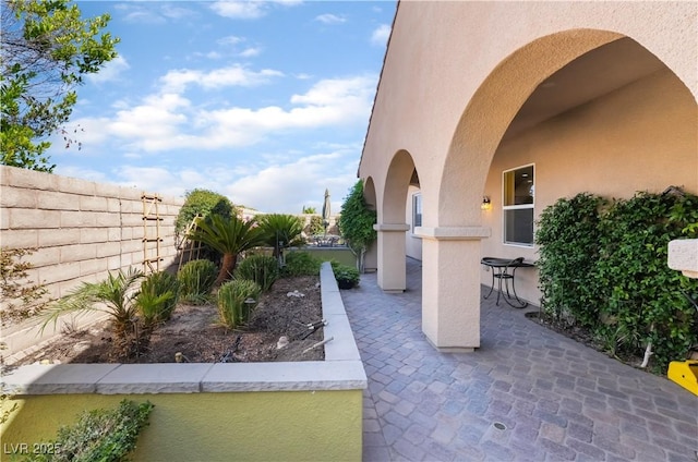 12276 Caminita Pl, Las Vegas, NV 89138 - fenced backyard featuring a patio
