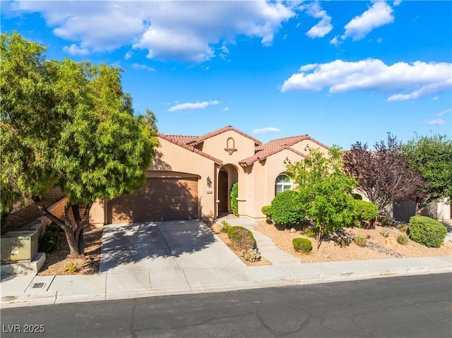 12276 Caminita Pl, Las Vegas, NV 89138 - mediterranean / spanish-style house featuring a tile roof, stucco siding, an attached garage, and driveway