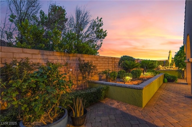 12276 Caminita Pl, Las Vegas, NV 89138 - patio terrace at dusk with a patio area