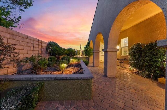 12276 Caminita Pl, Las Vegas, NV 89138 - patio terrace at dusk with a patio area