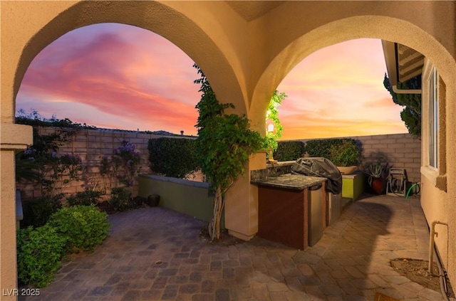 12276 Caminita Pl, Las Vegas, NV 89138 - view of patio / terrace featuring an outdoor kitchen