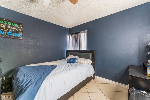 6224 Mandarin Dr, Las Vegas, NV 89108 - bedroom featuring tile patterned flooring, a textured ceiling, and ceiling fan