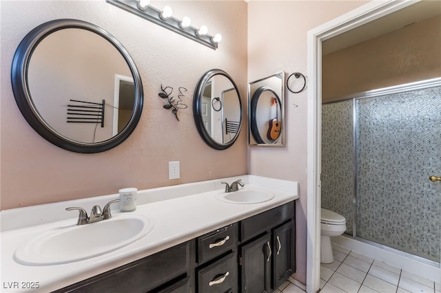 6224 Mandarin Dr, Las Vegas, NV 89108 - full bathroom featuring tile patterned floors, double vanity, and a stall shower