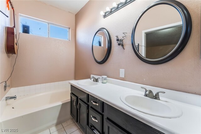 6224 Mandarin Dr, Las Vegas, NV 89108 - full bathroom with a bathtub, double vanity, and tile patterned floors