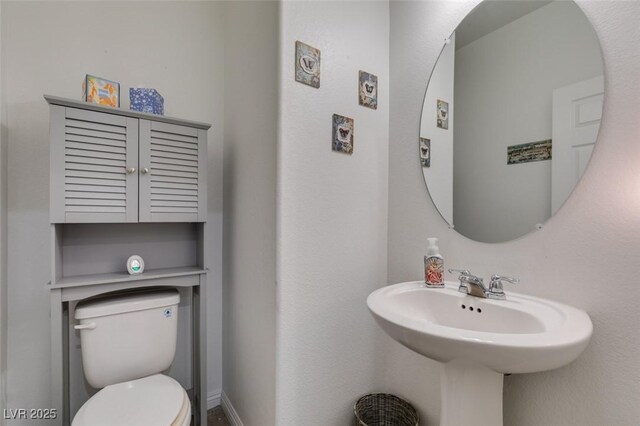 1200 Mission View Ct, Henderson, NV 89002 - bathroom featuring toilet and a sink