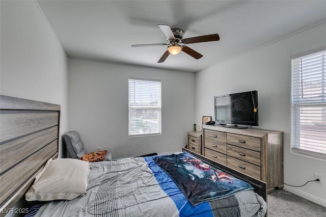 1200 Mission View Ct, Henderson, NV 89002 - bedroom with multiple windows, light colored carpet, and a ceiling fan
