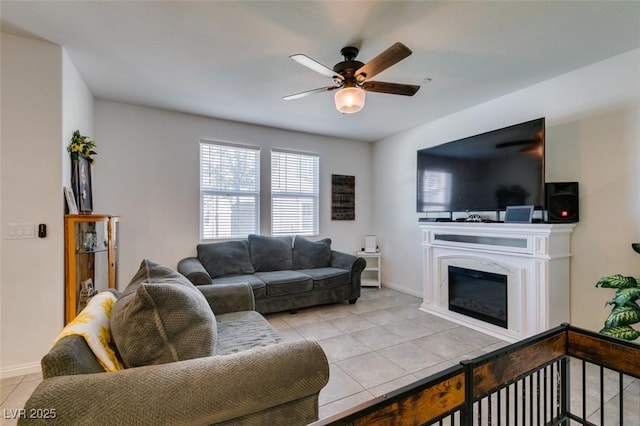 1200 Mission View Ct, Henderson, NV 89002 - living area featuring light tile patterned flooring, ceiling fan, and a glass covered fireplace